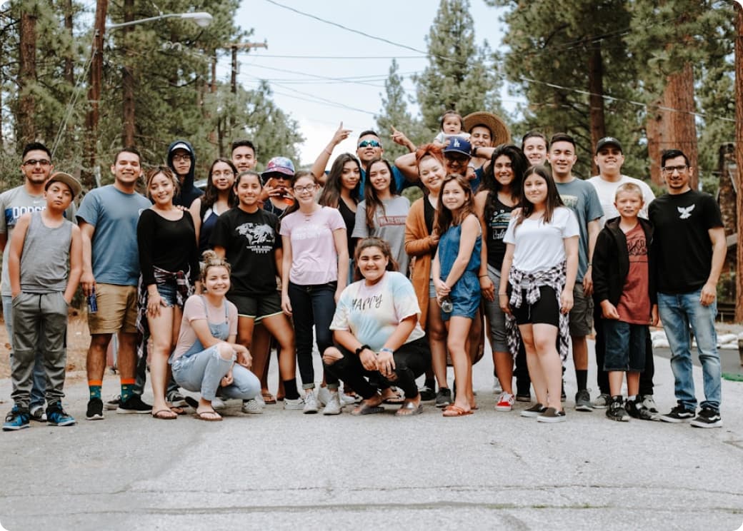 group picture of men, women and kids